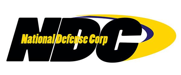 Amtec NDC Logo: There are three large black letters: "NDC". Inside the letters the following in gold lettering: National Defense Corp. There is also a yellow swoosh that starts on the top of the "D" in NDC and continues around and to the bottom of the "C" in NDC.