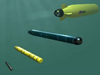 Undersea Vehicles; image of four metal weapons floating in water