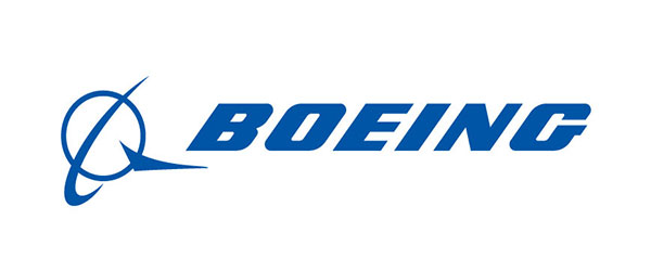 Image of Boeing label; "Boeing" is written in blue lettering with a symbol to the left in blue. The symbol is a circle with two slashes which makes it look like an icon of a planet. 